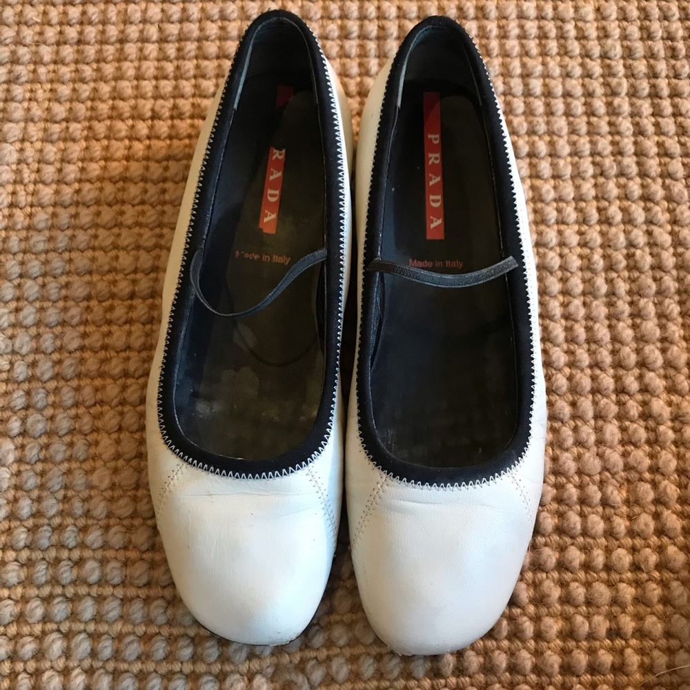White Prada slip on flats